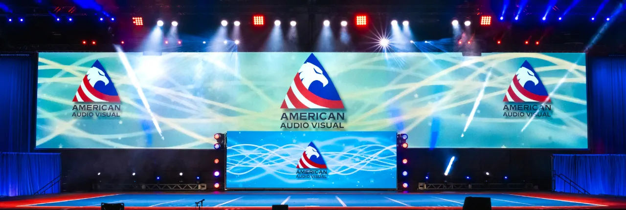 Cheer event at Orange County Convention Center with large LED screens and professional draping