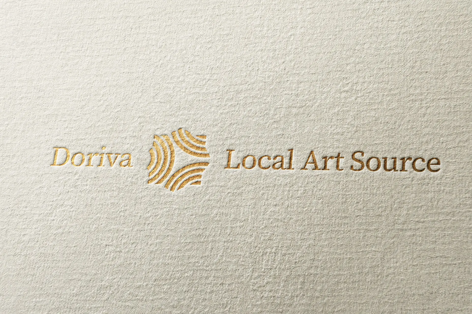 Doriva Local Art Source full logo with ripple mark icon in gold foil embossing on cream textured paper