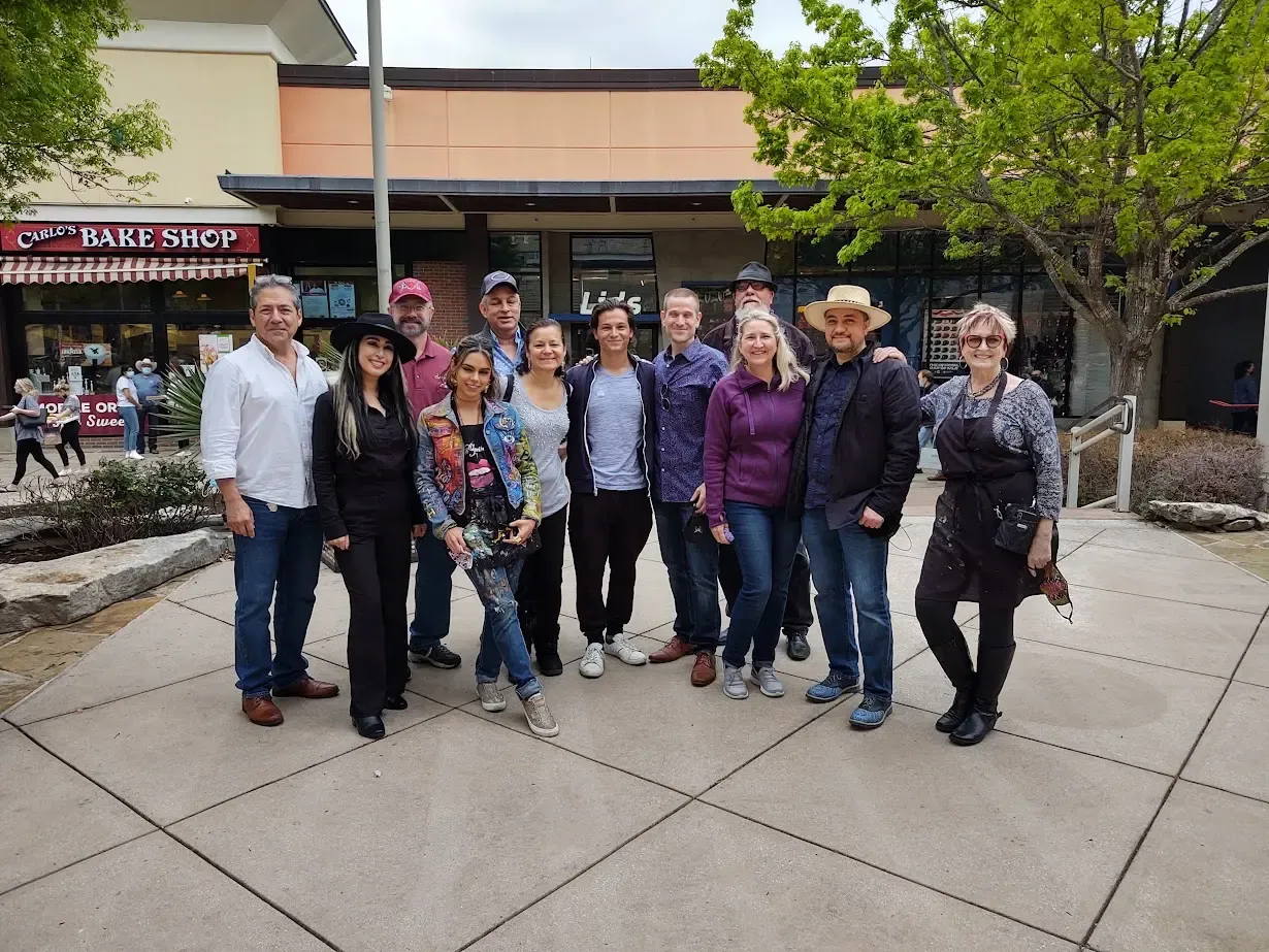 Doriva Local Art Source team and local artists gathered outside the gallery location in San Antonio